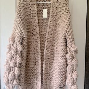 Women’s blush heavy bubble sleeve sweater